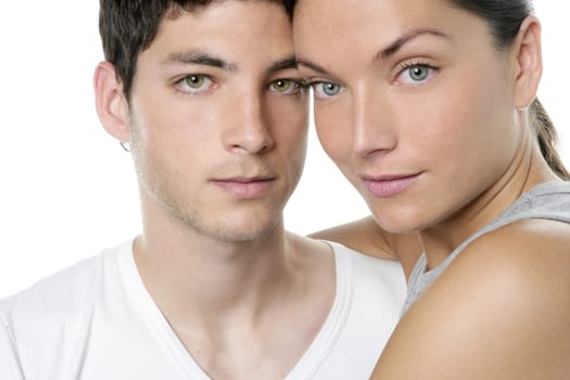 Beautiful young couple closeup portrait, two faces over white