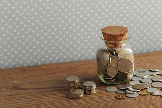 old coins on the wooden table