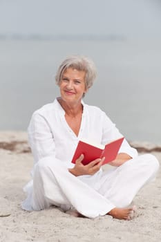 Active senior woman on the beach