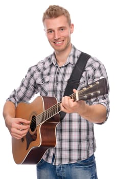 Studio shot of a young man with a guitar