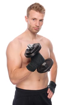 Studio shot of a young strength athlete against a white background