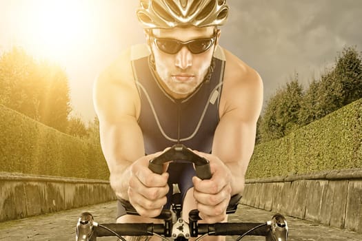 Man on a bicycle in backlight