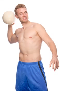 Studio shot of a young volleyball player against a white background