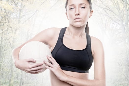 Young woman with a volleyball
