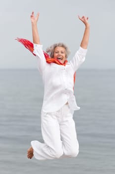 Active senior woman on the beach