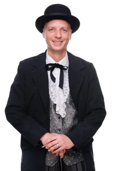 Man in western outfit against white background in studio
