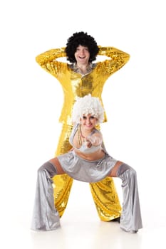 Young dancing couple in funny suits on a white background.