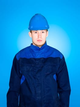 Portrait of a Manual Worker on blue background