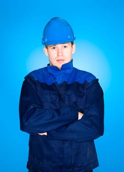 Portrait of a Manual Worker on blue background