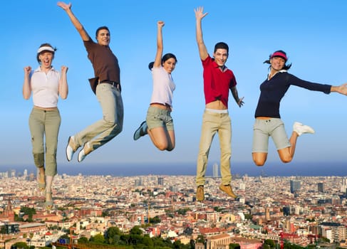 Jumping young people happy group over city buildings cityscape