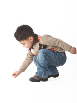 Adorable child in studio isolated on white background
