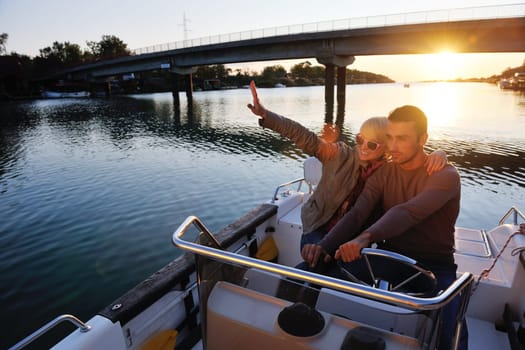 happy young couple in love  have romantic time at summer sunset   at ship boat while  representing urban and countryside fashin lifestyle
