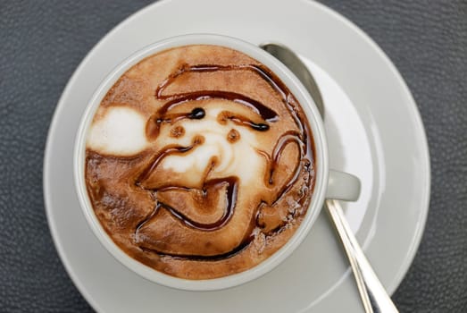 Epiphany designed with cappuccino with caramel