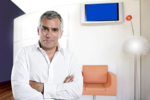 senior businessman posing in modern office interior