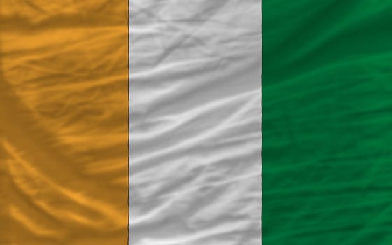 complete national flag of cote ivore covers whole frame, waved, crunched and very natural looking. It is perfect for background