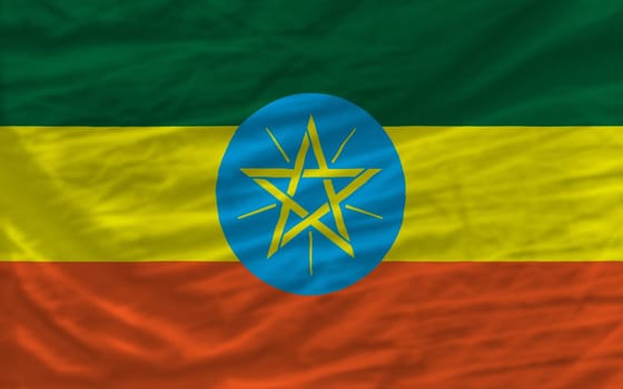 complete national flag of ethiopia covers whole frame, waved, crunched and very natural looking. It is perfect for background