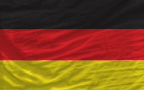 complete national flag of germany covers whole frame, waved, crunched and very natural looking. It is perfect for background
