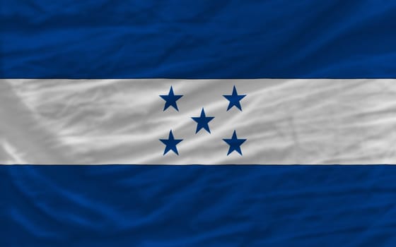 complete national flag of honduras covers whole frame, waved, crunched and very natural looking. It is perfect for background