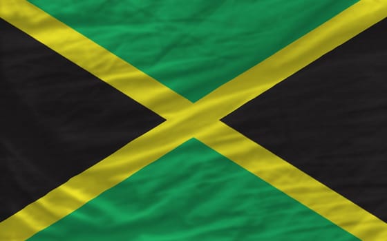 complete national flag of jamaica covers whole frame, waved, crunched and very natural looking. It is perfect for background
