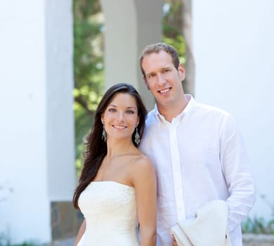 bride couple just married in mediterranean arches