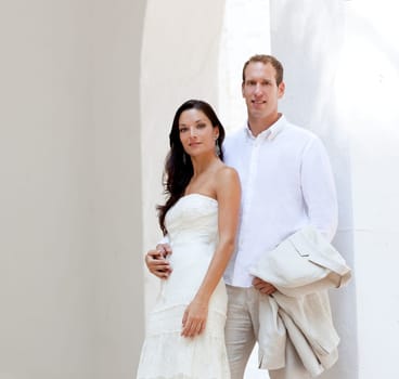 bride couple just married in mediterranean arches