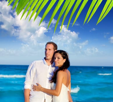 couple in love hug in blue sea vacation in Spain