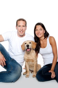 couple in love with puppy dog golden retriever isolated on white