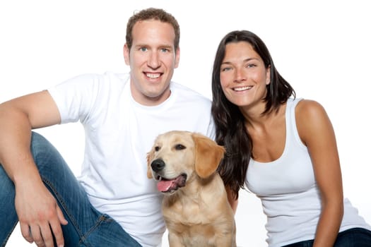 couple in love with puppy dog golden retriever isolated on white