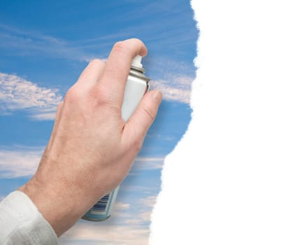 Environmental Concept - Hand Paints Blue Sky With Spray