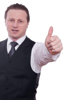 A businessman in a tie and vest holds a thumbs up