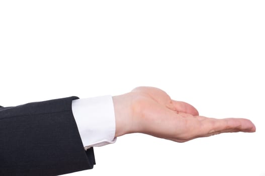 An arm with a suit and shirt holds out his hand