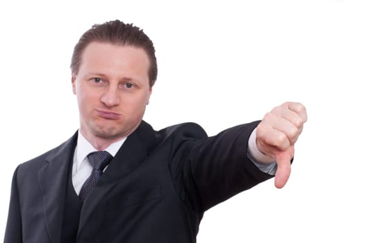 A man in a tie and suit is pointing with a thumbs down