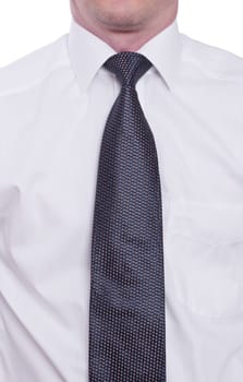 A man ties a tie