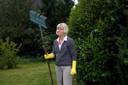 Senior woman working in the garden