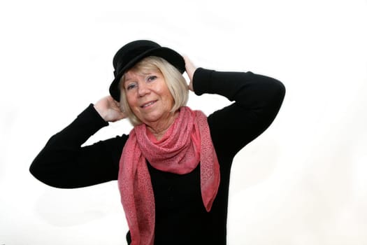 Portrait of a senior woman with a hat