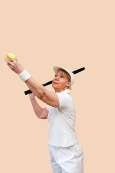 Senior woman playing tennis