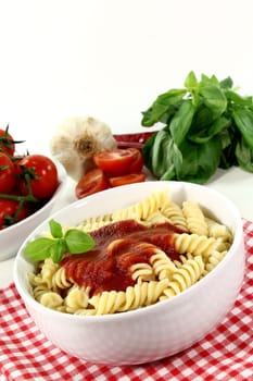 Fusilli with tomato sauce and basil