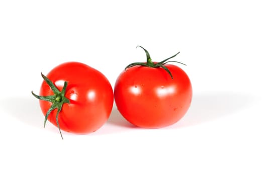 Tomato,fresh red vegetables against white background