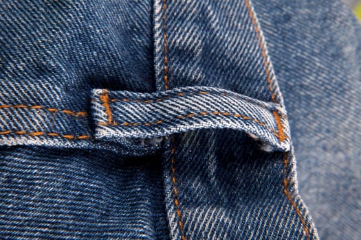 Blue jeans with yellow stitches