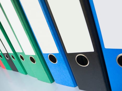 Ring binder in a row in perspective view