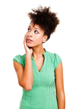 Portrait of a beautiful woman thinking. Studio shot with isolated white background.