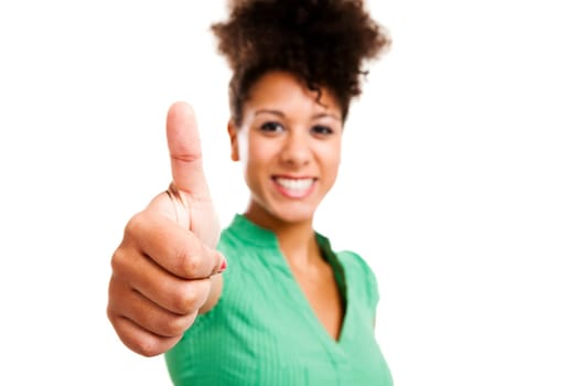 Beautiful african woman giving thumbs up and smiling. Studio shot with isolated white background.