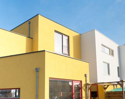newly build yellow and white houses in Almere, Netherlands