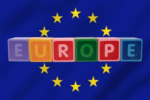 toy letters that spell europe against a flag background with clipping path
