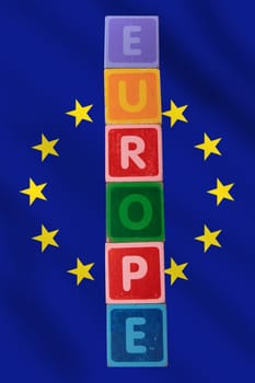 toy letters that spell europe against a flag background with clipping path