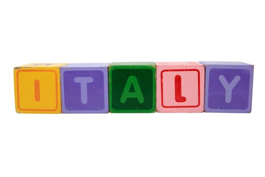 toy letters that spell italy against a white background with clipping path