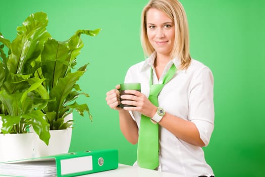 Green business office woman drink coffee plant environment friendly smile