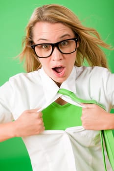Green Superhero Businesswoman crazy face Emerges from shirt