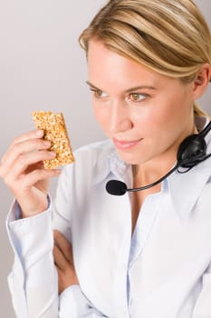 Customer care service center woman operator have break phone headset