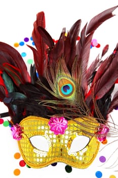 Carnival mask with confetti on white background